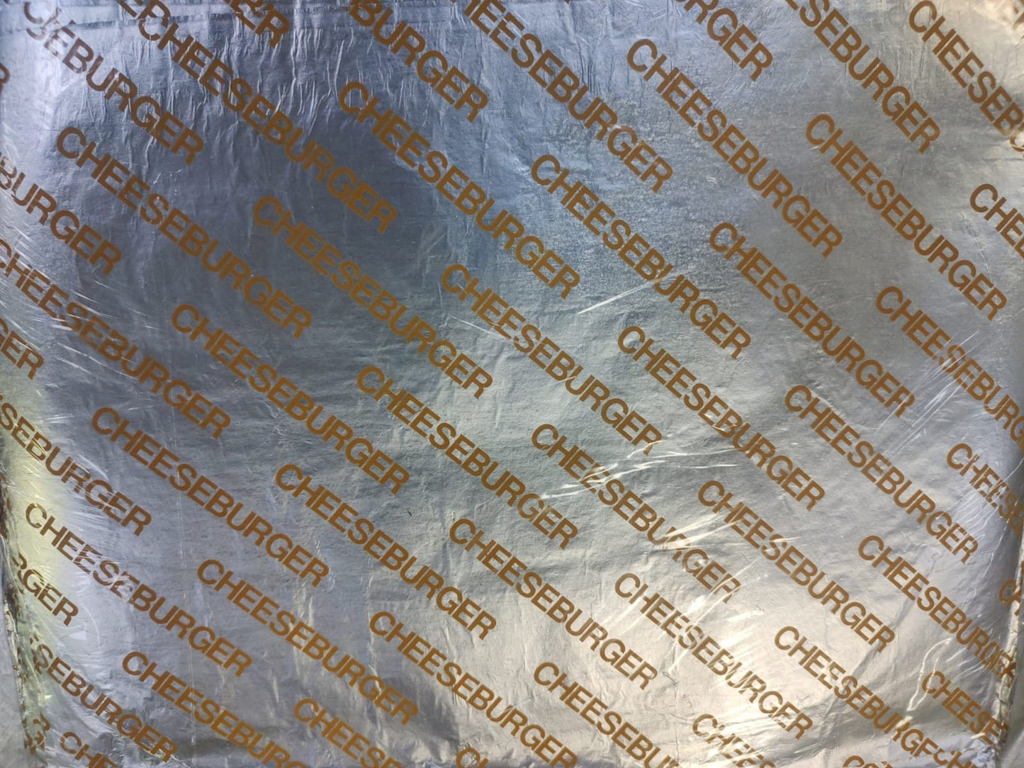 Yellow Cheeseburger Print Cushion Foil Sandwich Wrap, 10.5"" x 14"", 2,500 sheets per case packed 5/500's